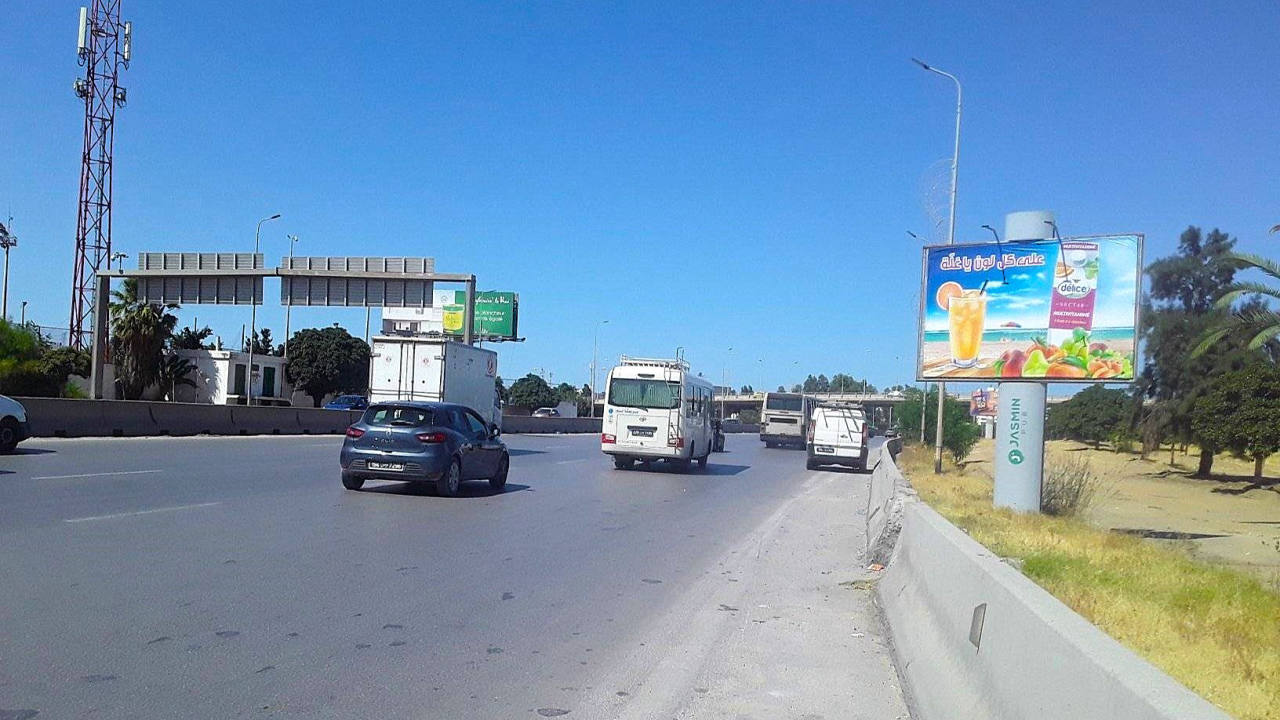 Panneau publicitaire V163 – Niveau Parc B et Cité de la Culture, direction GP9, Aéroport, Route X, Géant, Bizerte